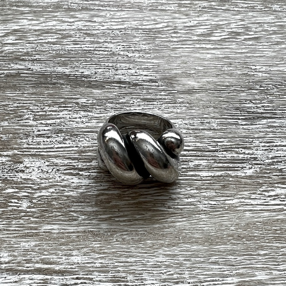 James Avery Sisterhood ring, size 6. .925 silver. Normal wear and tear.